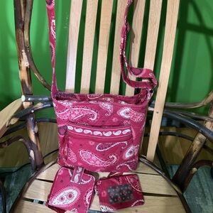 Vera Bradley red quilted crossbody bag.